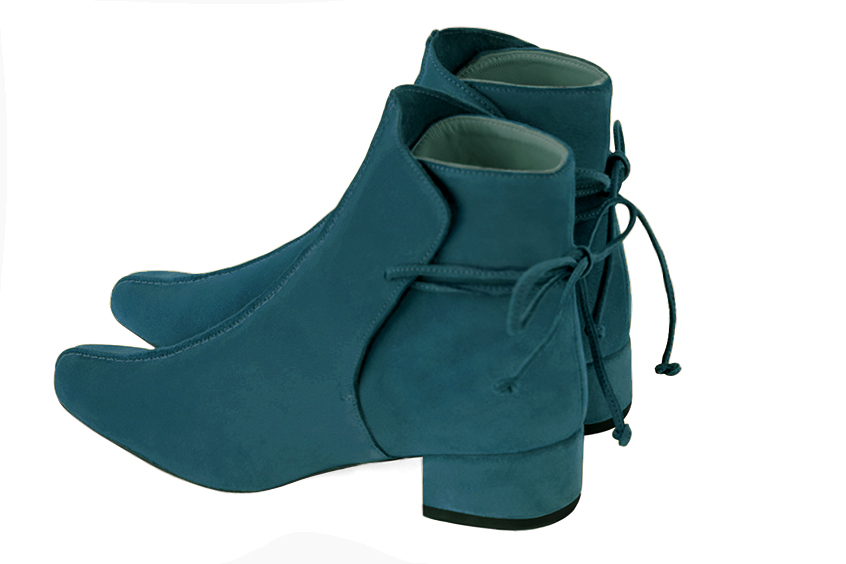 Peacock blue women's ankle boots with laces at the back. Round toe. Low block heels. Rear view - Florence KOOIJMAN